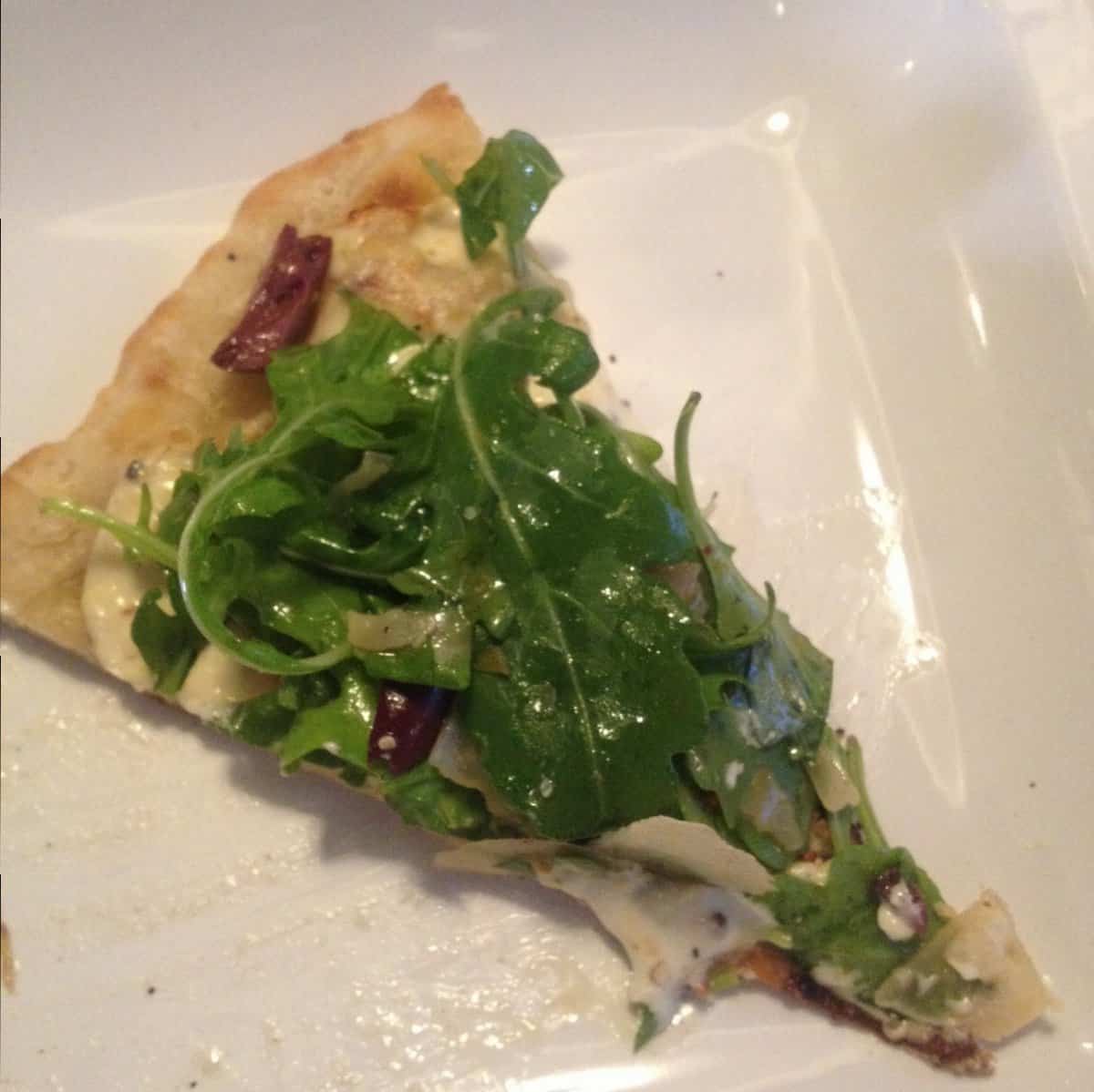 Goat Cheese and Arugula Pizza with Balsamic Pepperoncini Vinaigrette